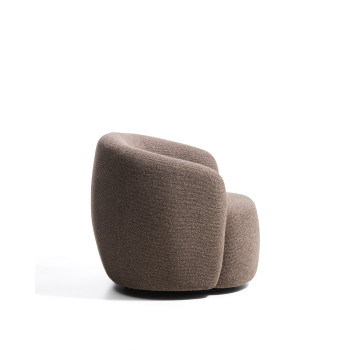 Odenia swivel armchair in micro bouclé