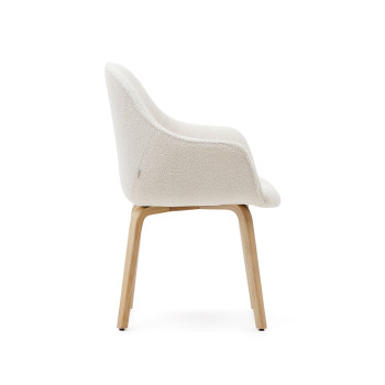 Aleli chair in white shearling and solid ash wood legs with a natural finish