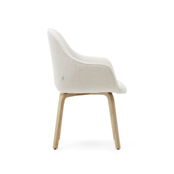Aleli chair in white shearling and solid ash wood legs with a natural finish