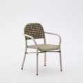 Tuccia stackable chair in aluminum and beige and green synthetic rattan