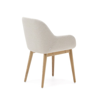 Beige Konna chair with solid ash wood legs and natural finish