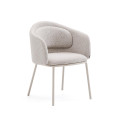 Minda chair in thick beige chenille with steel legs in a blue finish. FSC Mix Credit.
