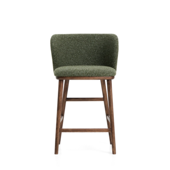 Ciselia stool in thick dark green chenille and solid ash wood legs with a walnut finish.
